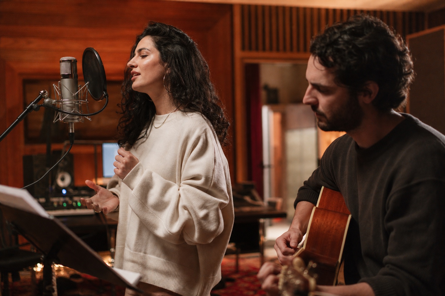 Singer recording a custom commercial jingle in the studio